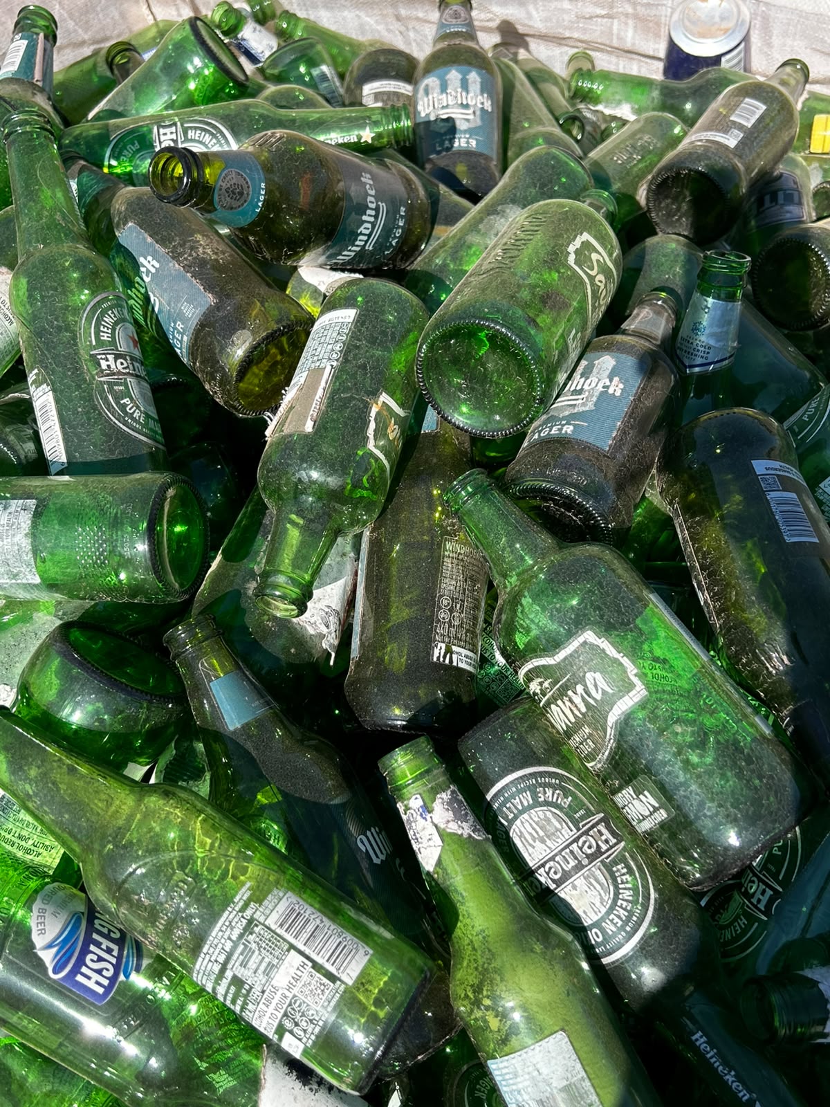 Green glass sorted for recycling